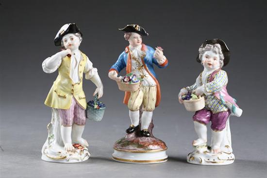 Appraisal: THREE PORCELAIN FIGURES OF BOYS Germany th century All are