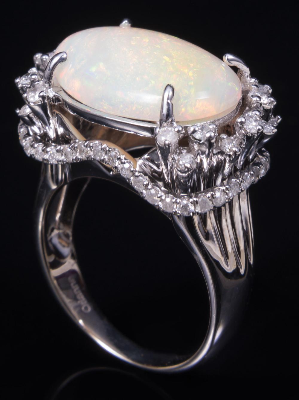 Appraisal: kt White Gold Opal and Diamond Ring center prong set