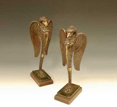 Appraisal: A pair of bronze and parcel gilt eagle monopodia door