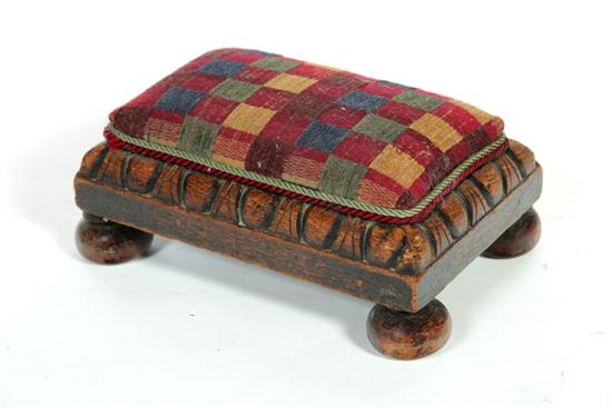 Appraisal: CARVED FOOTSTOOL England th century oak Small stool with simplified