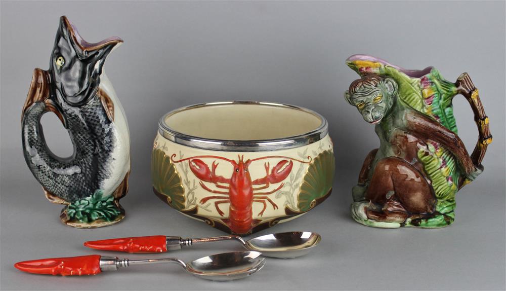 Appraisal: TWO MAJOLICA JUGS one as a monkey seated before palm