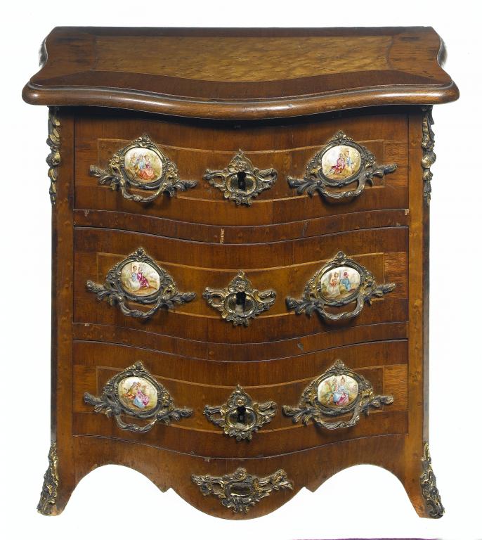 Appraisal: A FRENCH WALNUT AND MAPLE MINIATURE SERPENTINE COMMODE with giltmetal