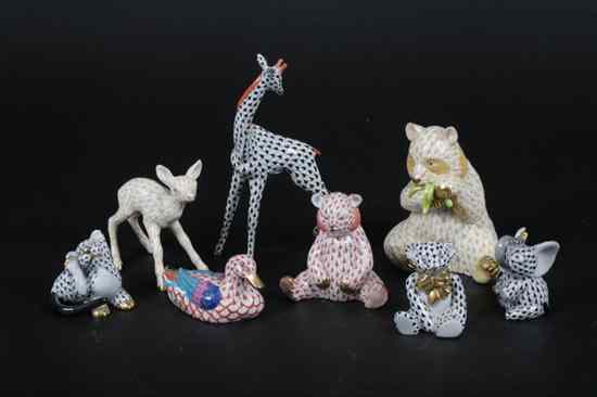 Appraisal: EIGHT MINIATURE HEREND PORCELAIN ANIMALS Including giraffe panda doe teddy