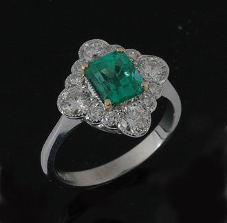 Appraisal: An Art Deco style emerald and diamond ring The cartouche