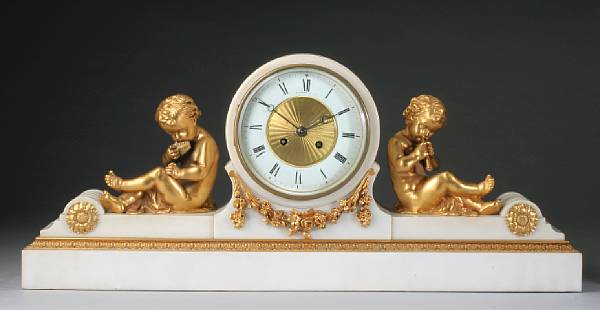 Appraisal: A French gilt bronze and marble mantel clock retailed by