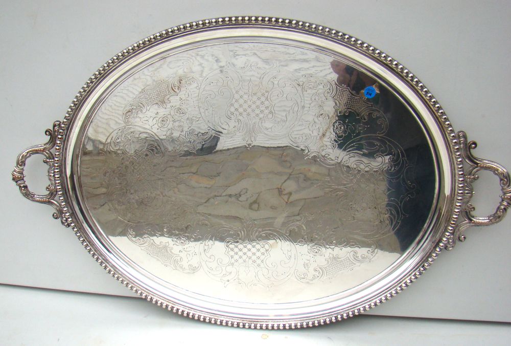 Appraisal: OVAL SILVER PLATED TRAY With beaded border engraved field and