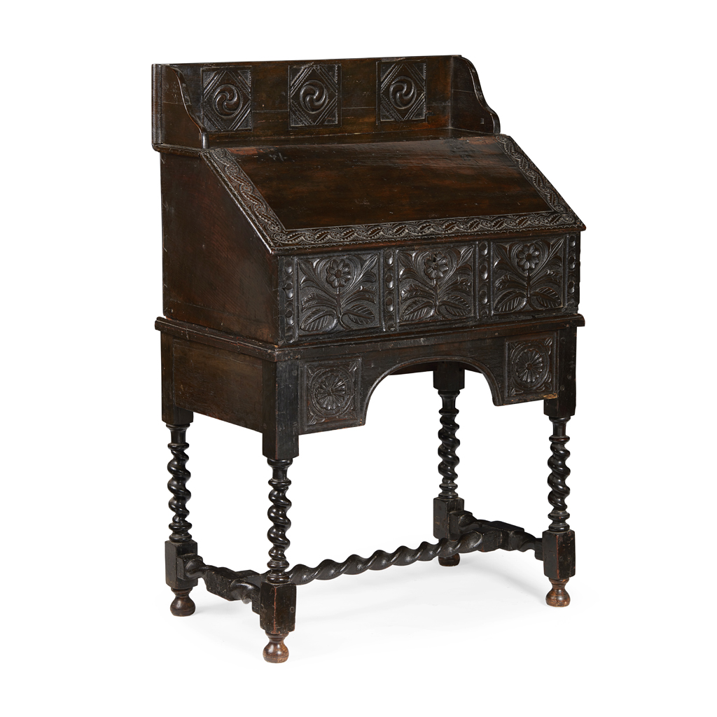 Appraisal: CHARLES II OAK BUREAU TH CENTURY AND LATER the carved