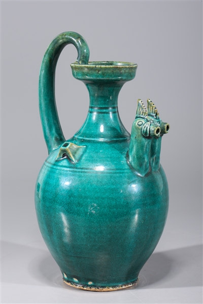 Appraisal: Chinese blue green glazed double chicken spout ewer with incised