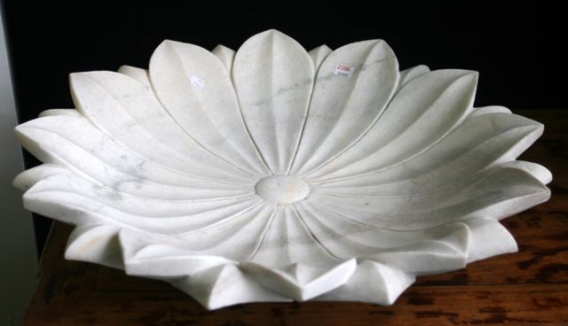 Appraisal: A hand carved white marble bowl in the shape of