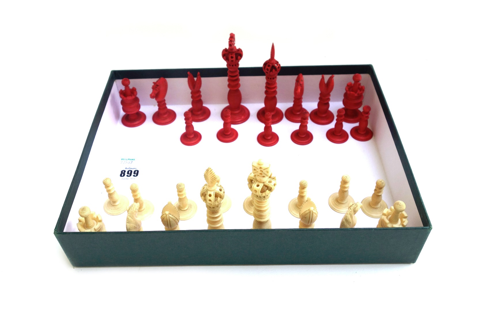 Appraisal: A late th century stained ivory chess set of turned