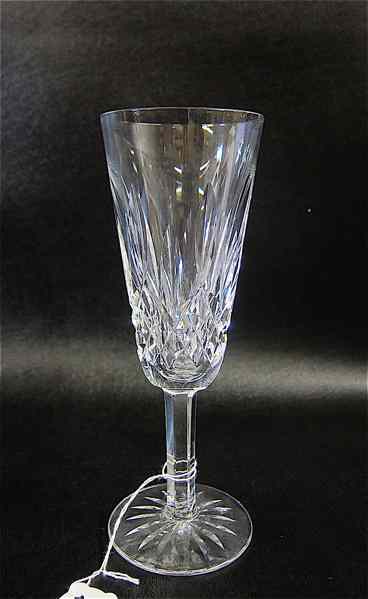 Appraisal: FIFTEEN WATERFORD CRYSTAL FLUTED CHAMPAGNES in the ''Lismore'' pattern ''H