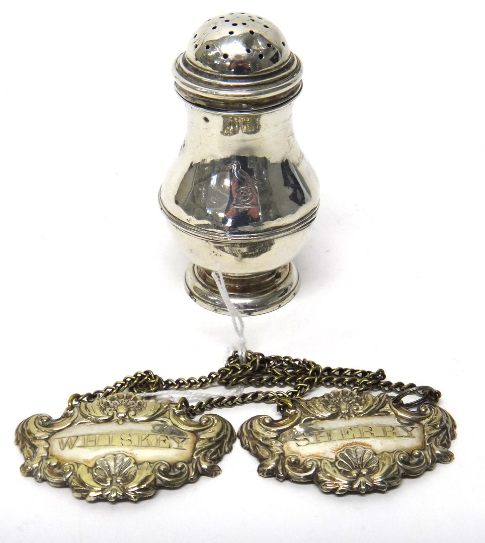 Appraisal: A George III silver baluster shaped large pepperette on a