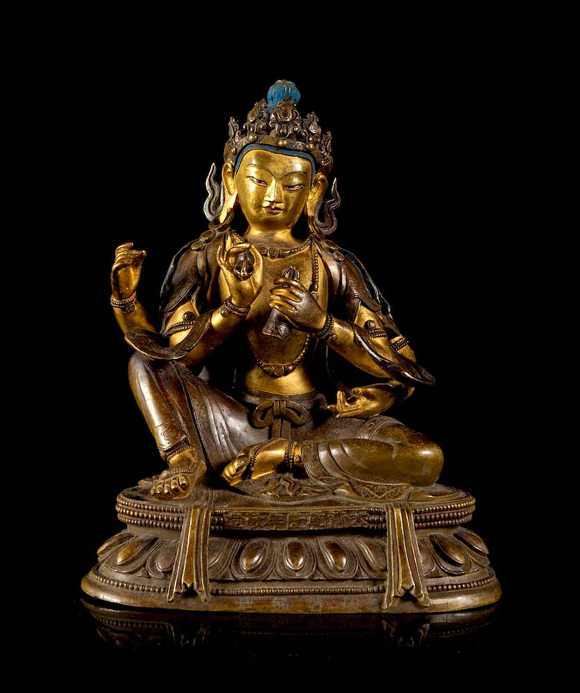 Appraisal: A Sino-Tibetan Gilt Bronze Figure of a Four-Armed Avalokitesvara Bodhisattva