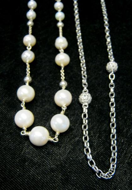 Appraisal: Two sterling silver necklacesOne set with white luster pearls of