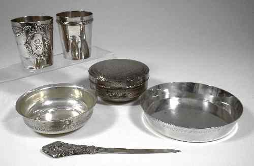 Appraisal: A silvery metal tumbler with raised decoration of swags and