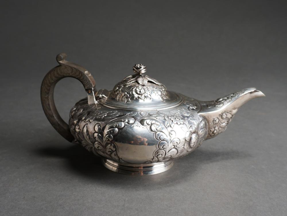 Appraisal: GEORGE IV REPOUSSE SILVER TREEN HANDLE TEAPOT POSSIBLY BY JOSEPH