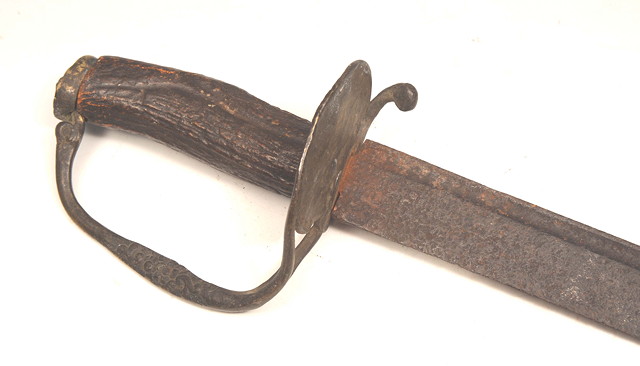 Appraisal: AN ANTIQUE SHORT SWORD with iron blade horn handle and