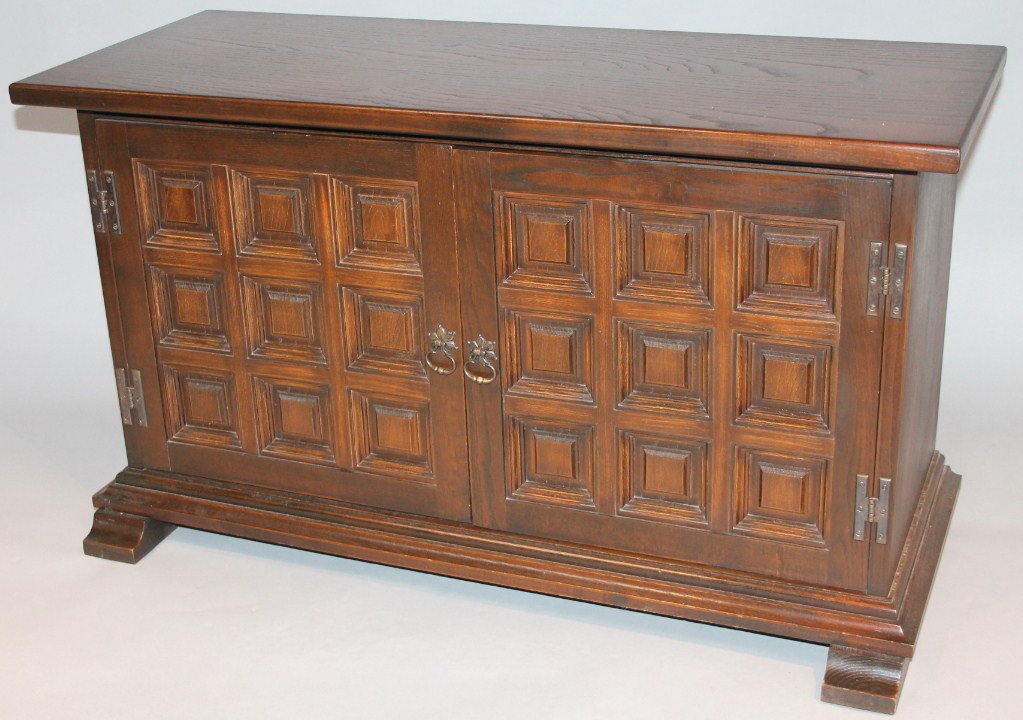 Appraisal: A modern Old Charm style hardwood television table the rectangular