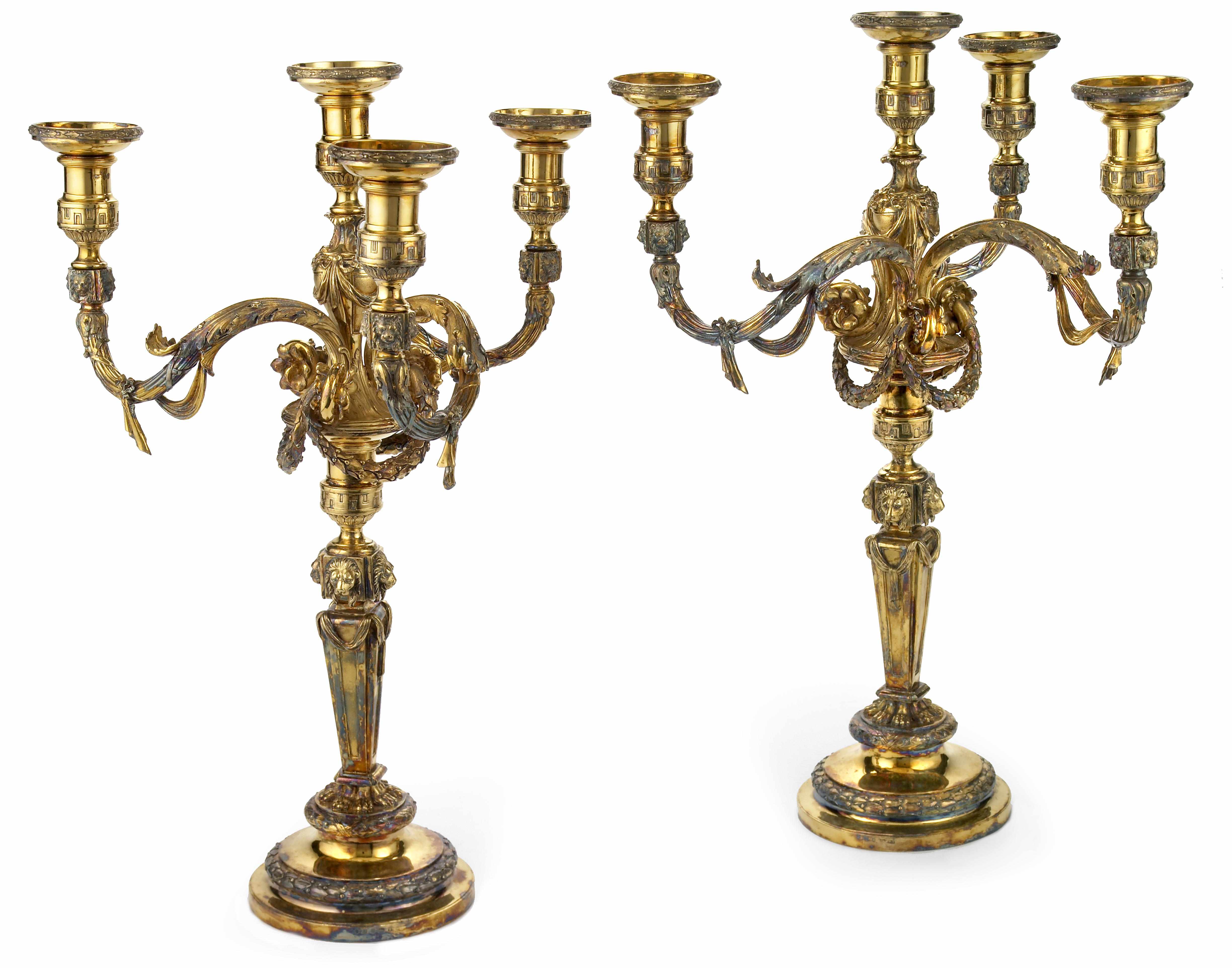 Appraisal: A George lll silver gilt pair of candlesticks with William