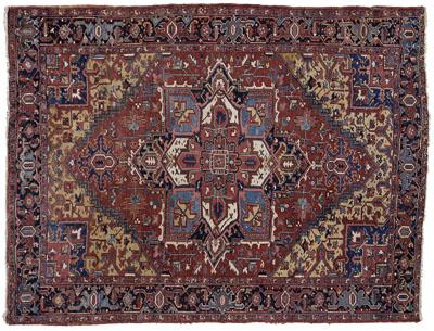 Appraisal: Heriz rug central medallion on brick red field ft in