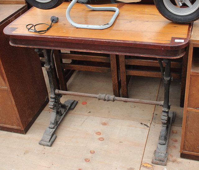 Appraisal: A VICTORIAN CENTRE TABLE with black painted cast iron base