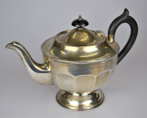 Appraisal: A silver teapot on stemmed foot Viners Sheffield oz gross