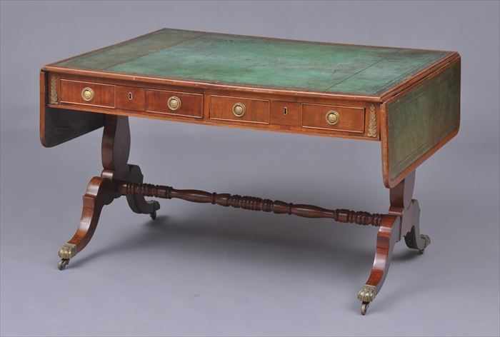 Appraisal: REGENCY MAHOGANY LIBRARY TABLE The top with two leaves and