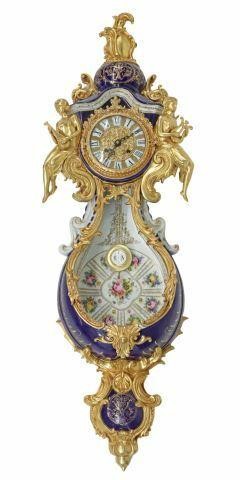 Appraisal: Sevres style parcel gilt and cobalt glazed porcelain cartel clock