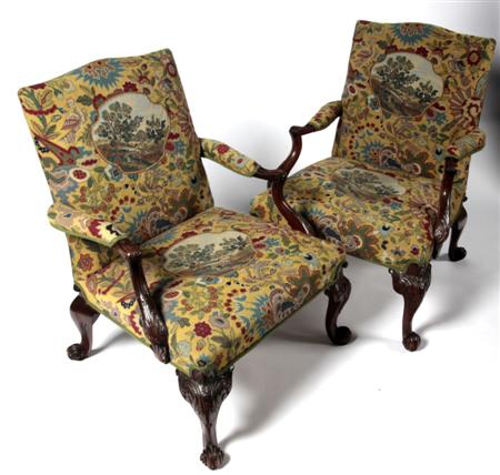 Appraisal: A pair of Chippendale style mahogany armchairs each with arched