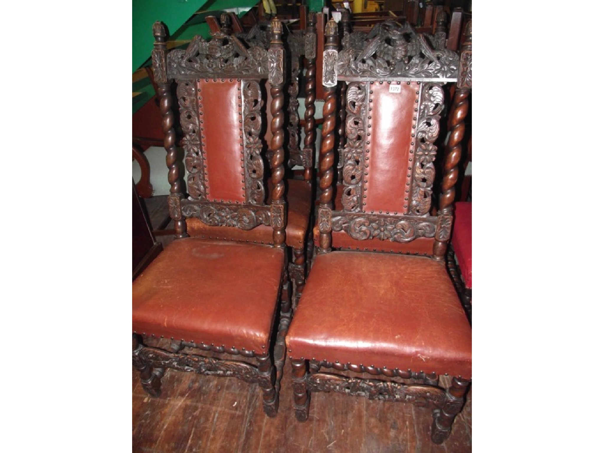 Appraisal: A set of four th century oak dining chairs in