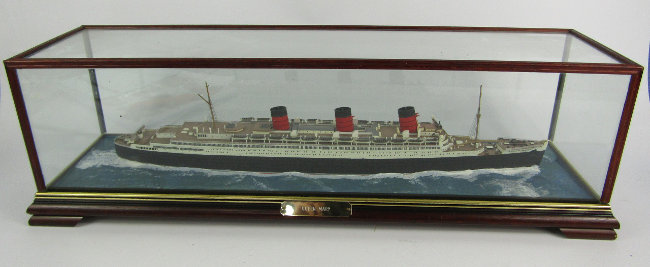 Appraisal: A scale model of the liner Queen Mary cased with