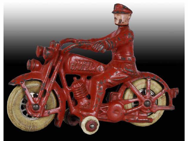 Appraisal: Red Cast Iron Hubley Harley Davidson Motorcycle Description Swivelhead policeman