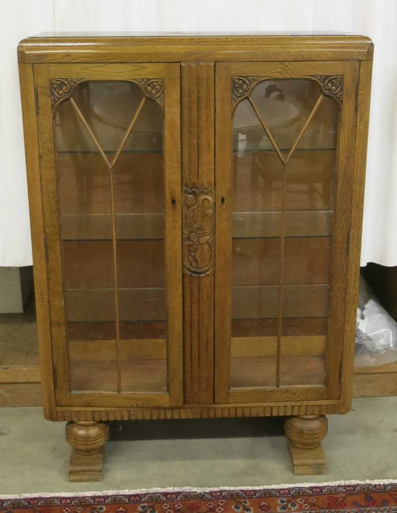 Appraisal: GLASS AND CARVED OAK CHINA CABINET English mid- th century