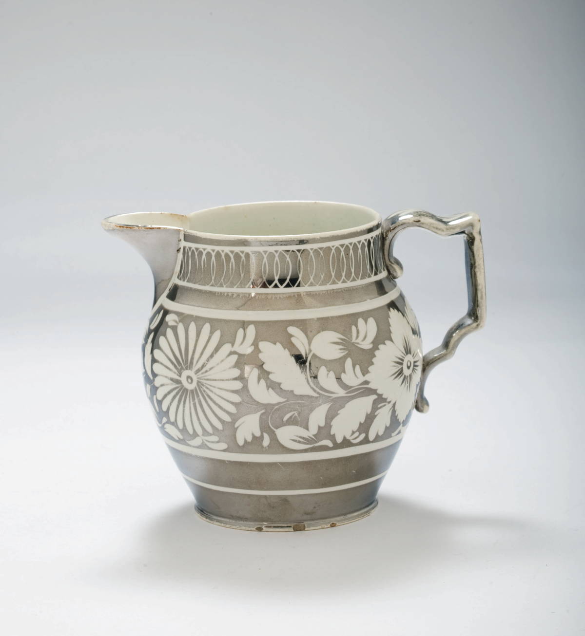 Appraisal: BRITISH SILVER RESIST LUSTRE JUG BOARDMAN CIRCA Resisted with a