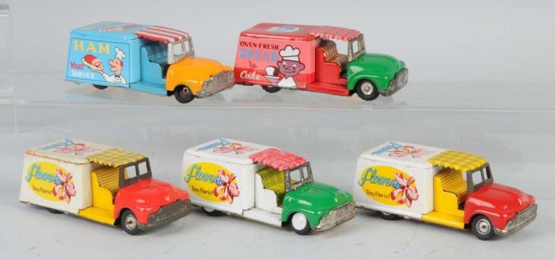 Appraisal: Lot of Tin Food Truck Friction Toys Description Japanese Working