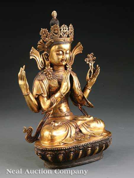 Appraisal: A Chinese Gilt Bronze Figure of Avalokitesvara modeled seated in