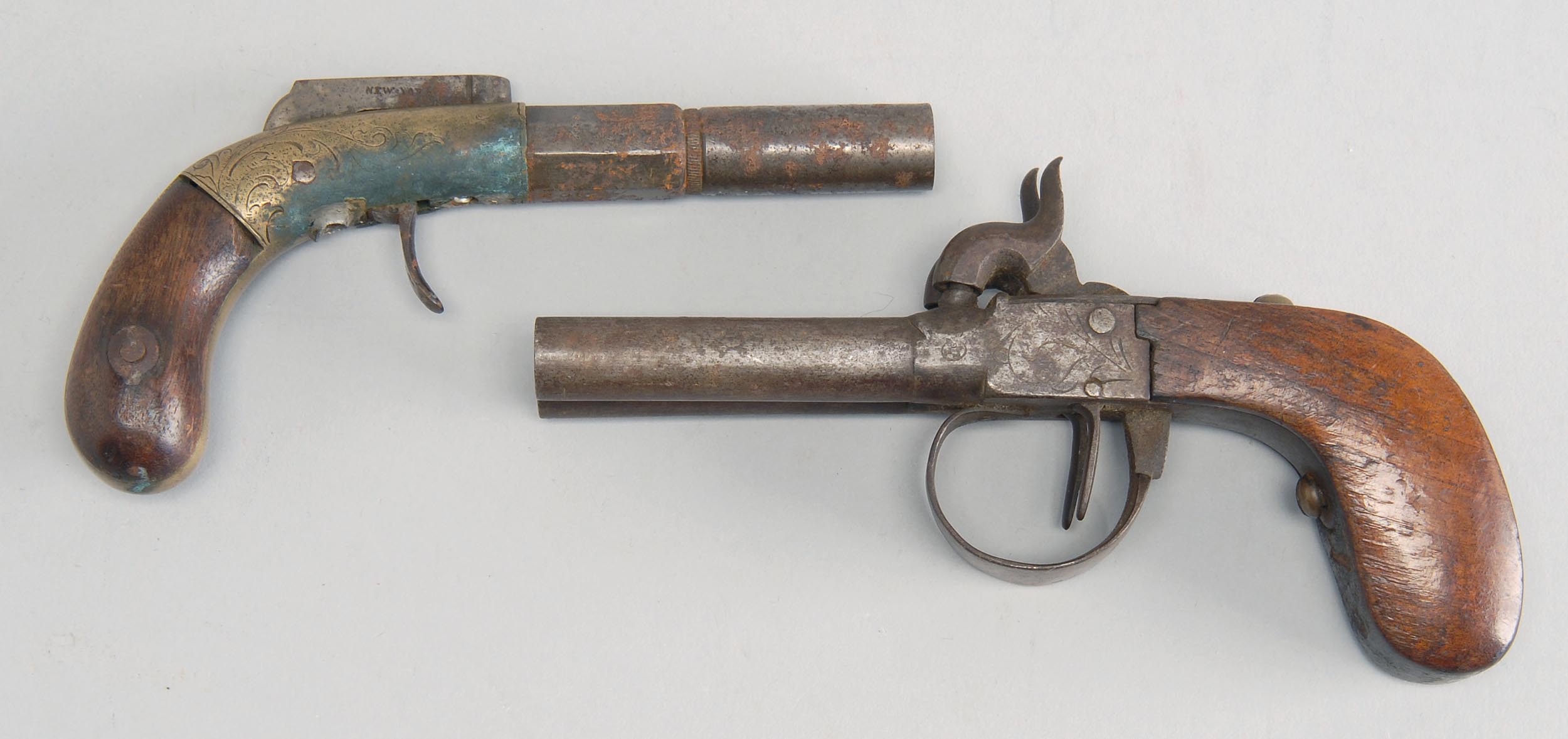 Appraisal: TWO PERCUSSION PISTOLS th Century cal Belgian double barrel Length