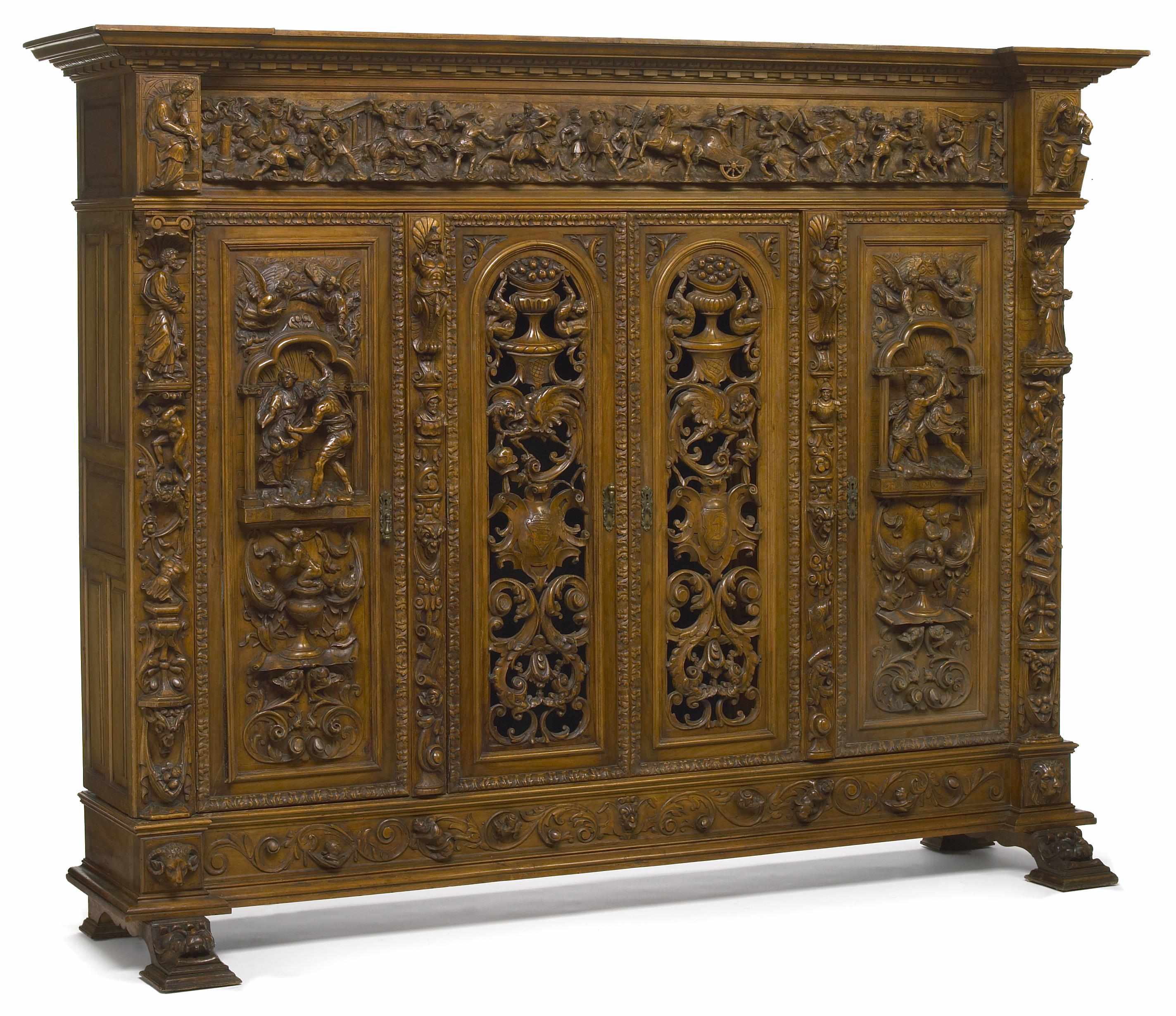 Appraisal: An imposing Renaissance Revival carved wanut cabinet late th century