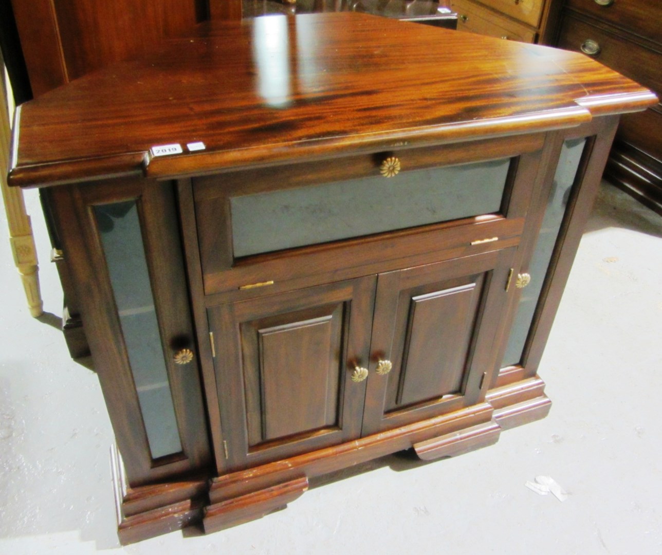 Appraisal: A th century hardwood corner television cabinet