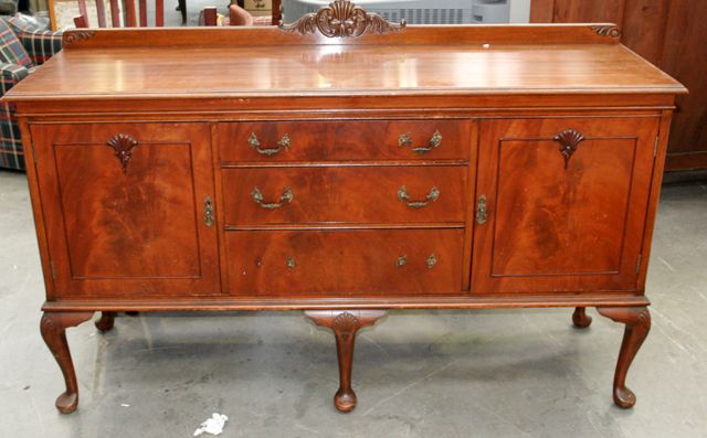 Appraisal: A s oak sideboard raised on cabriole legs cm wide