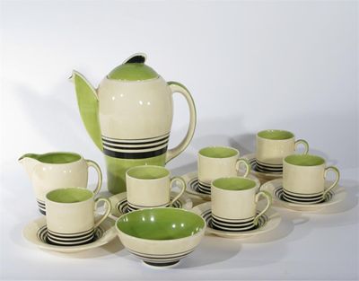 Appraisal: A Susie Cooper Productions Graduated Bands Kestrel coffee set for