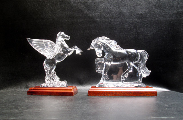 Appraisal: TWO WATERFORD CRYSTAL FIGURINES from the Legends and Lore Collector's