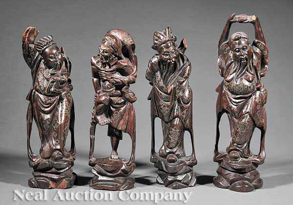 Appraisal: A Group of Four Chinese Carved Wood and Silver Wire