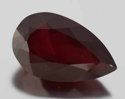 Appraisal: An Unmounted Pear Cut Garnet Carat Pear faceted cut weighting