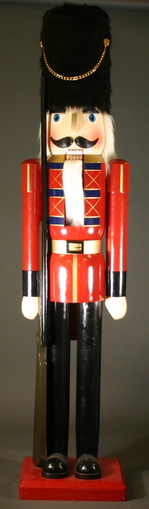 Appraisal: Large modern British Guard nutcracker With rifle '