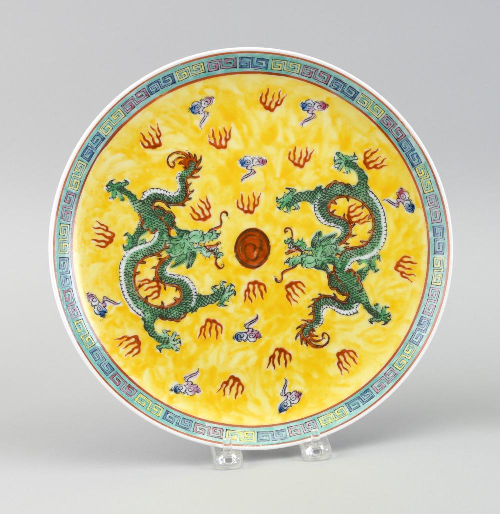 Appraisal: JAPANESE FAMILLE JAUNE PORCELAIN PLATE th Century Depicts two green