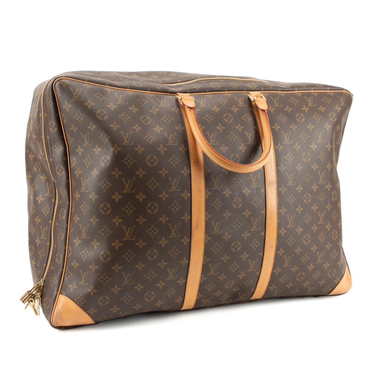 Appraisal: VINTAGE LOUIS VUITTON 'SIRIUS' SUITCASE Vintage Louis Vuitton 'Sirius' monogram