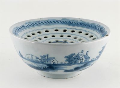 Appraisal: A Delftware blue and white colander or cress bowl probably