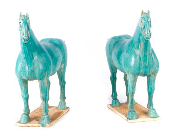 Appraisal: A pair of Chinese Tang style blue glazed horses height