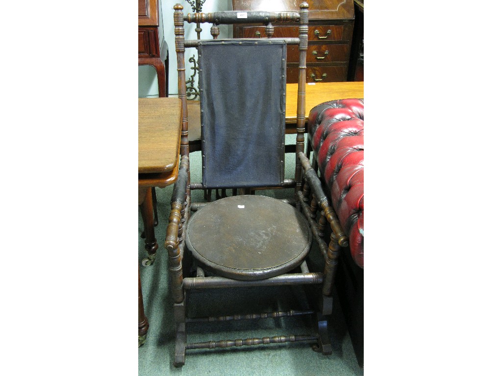 Appraisal: Rocking chair with turned supports